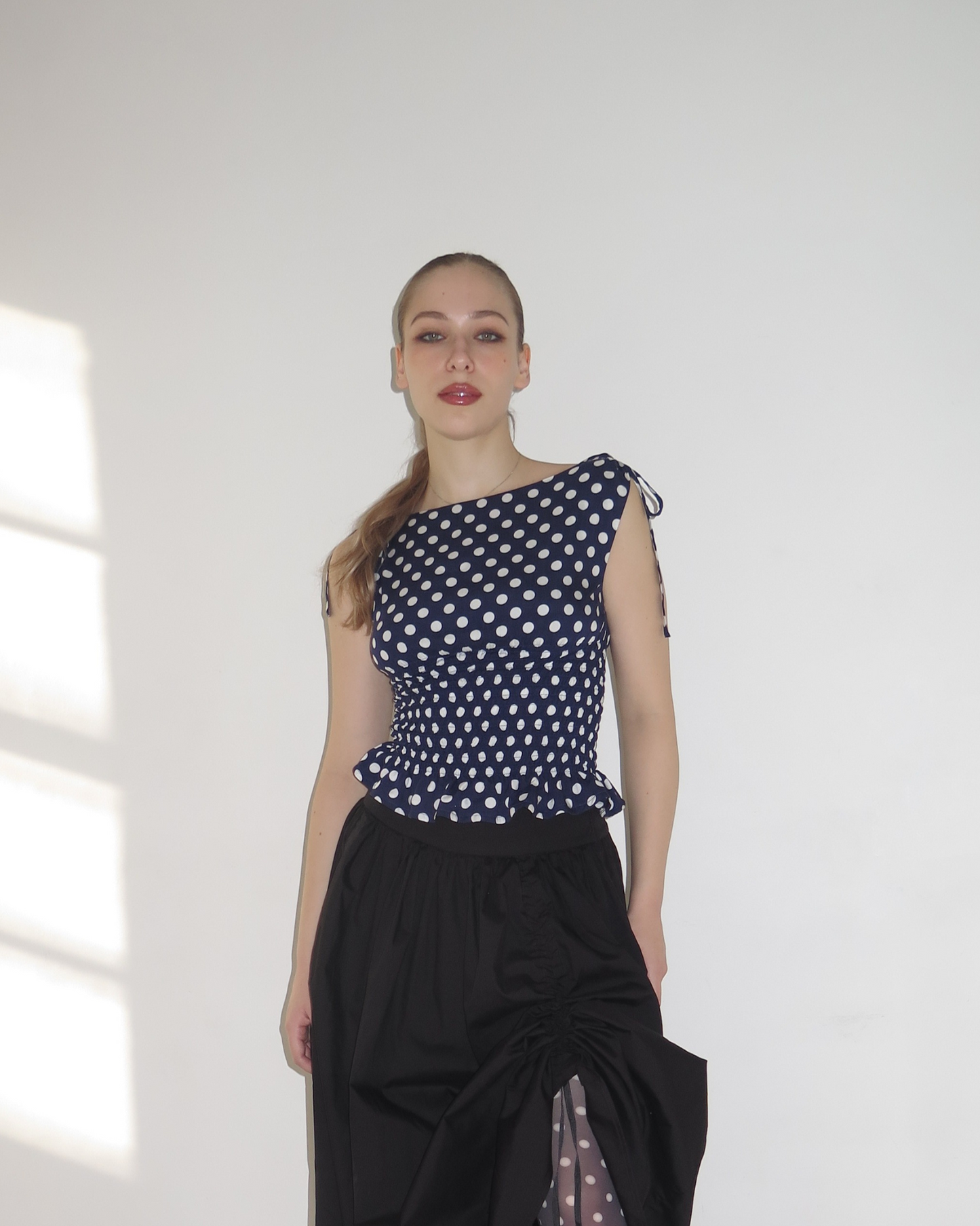 The Amélie Top in Navy Polka Dot