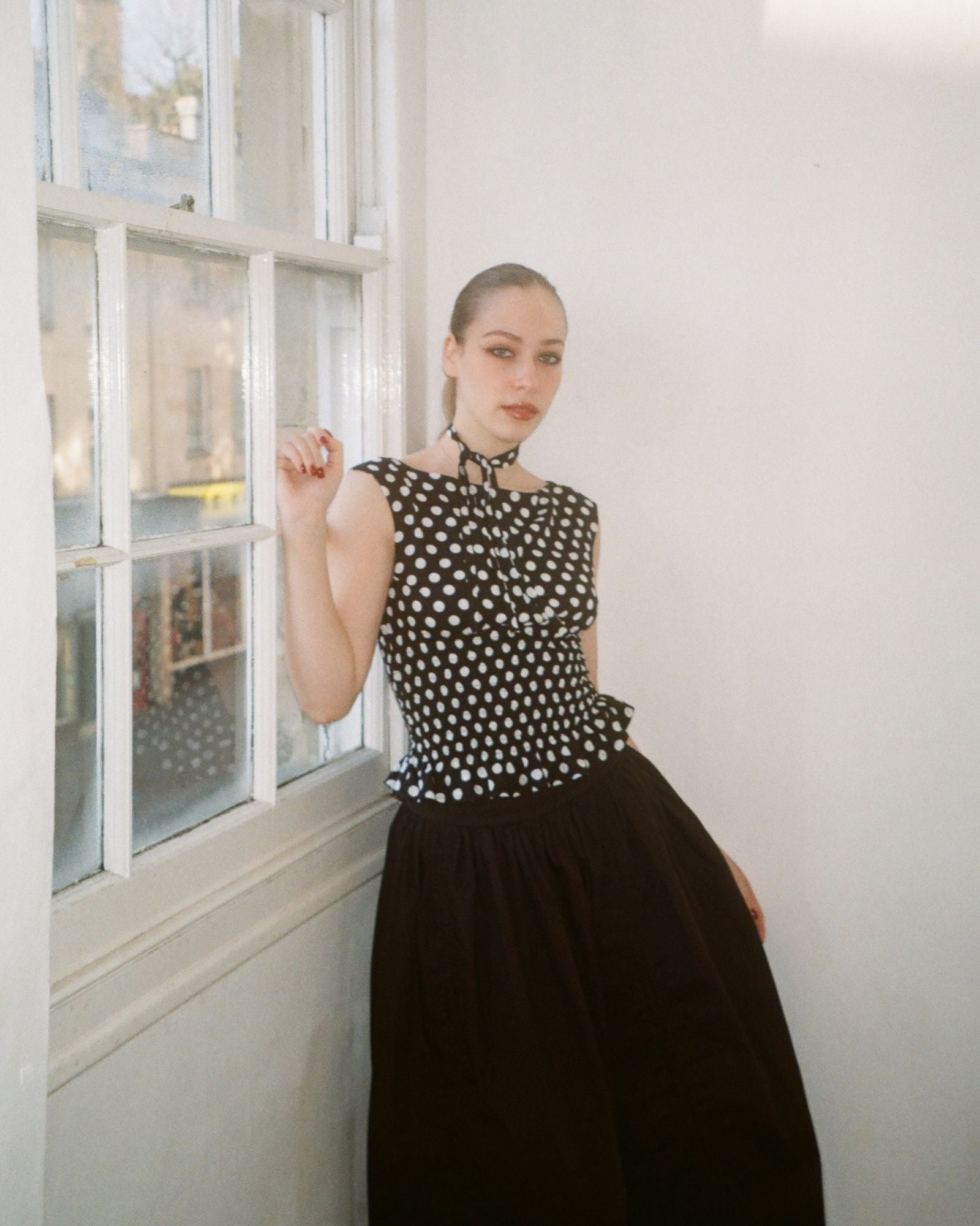 The Amelie Top in Black Polka Dot