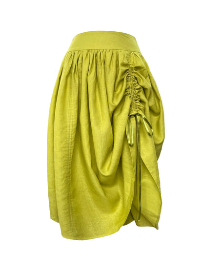lime green skirt with ruched detail on a white background